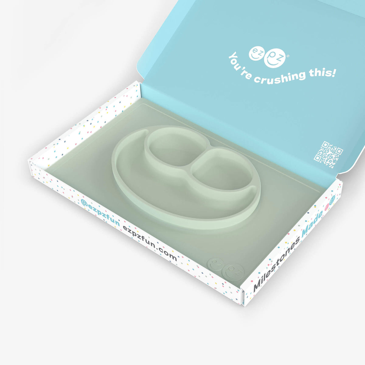 ezpz Kit 4 - Celebrate Mealtime Independence in Sage Green includes the Happy Mat, Happy Utensils, and Micro Mat 