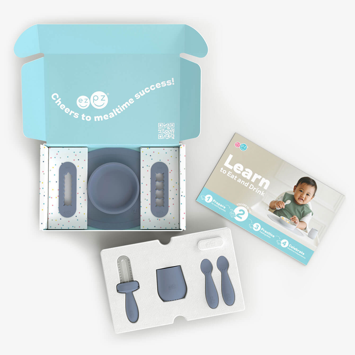 ezpz Kit 2 in Indigo Blue for learning to eat and drink at age 6 months and up 