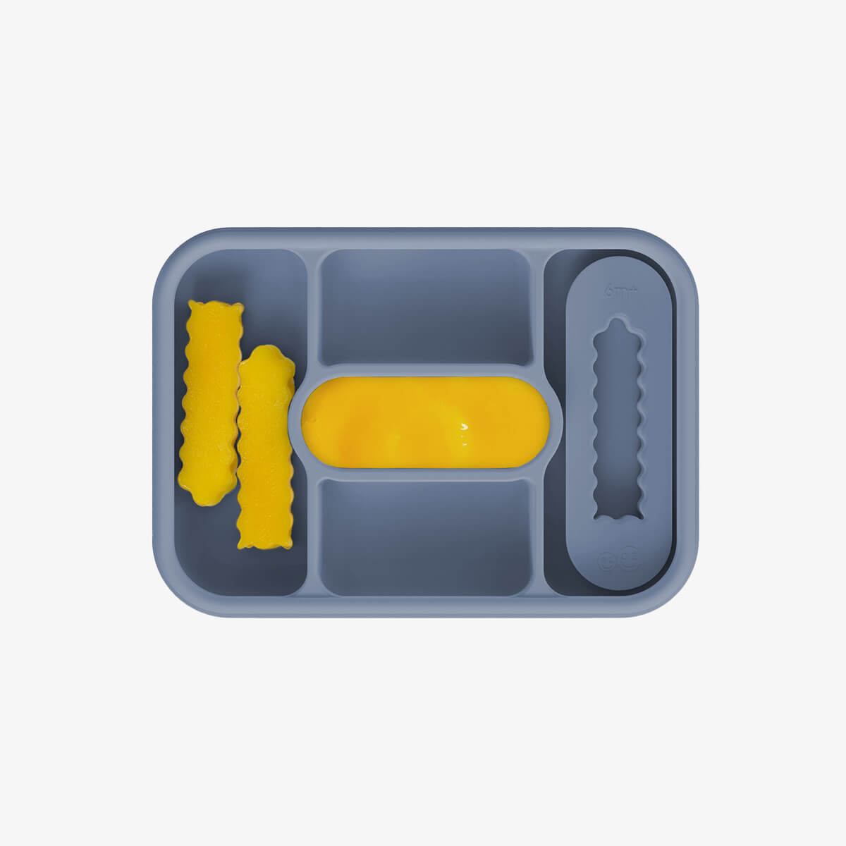 ezpz travel box in indigo blue is an all-in-one feeding + storage system that helps families pack, transport, and serve baby’s meals when away from home 