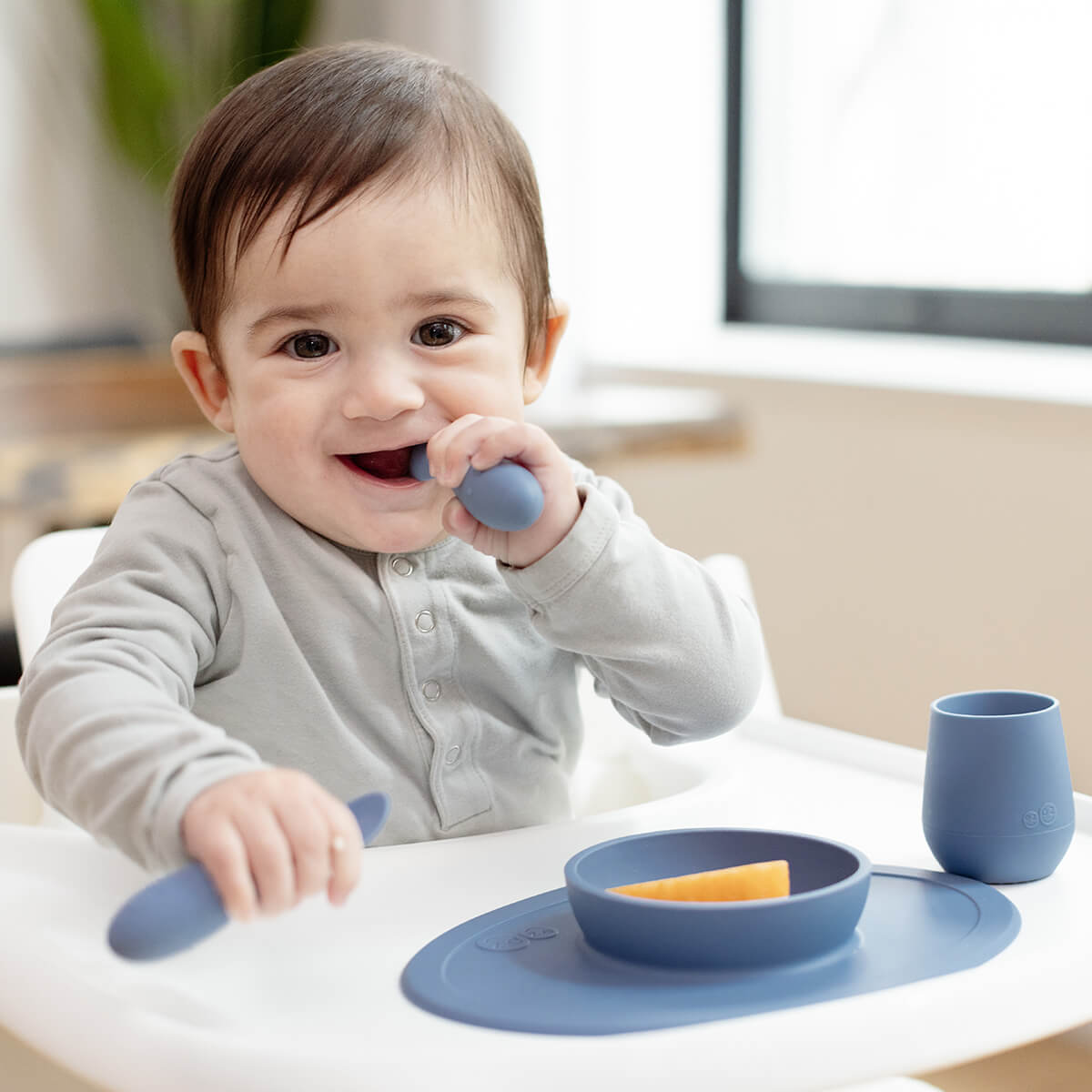 The Tiny Spoon in Indigo Blue by ezpz / Small, Sensory Silicone Spoon for Babies