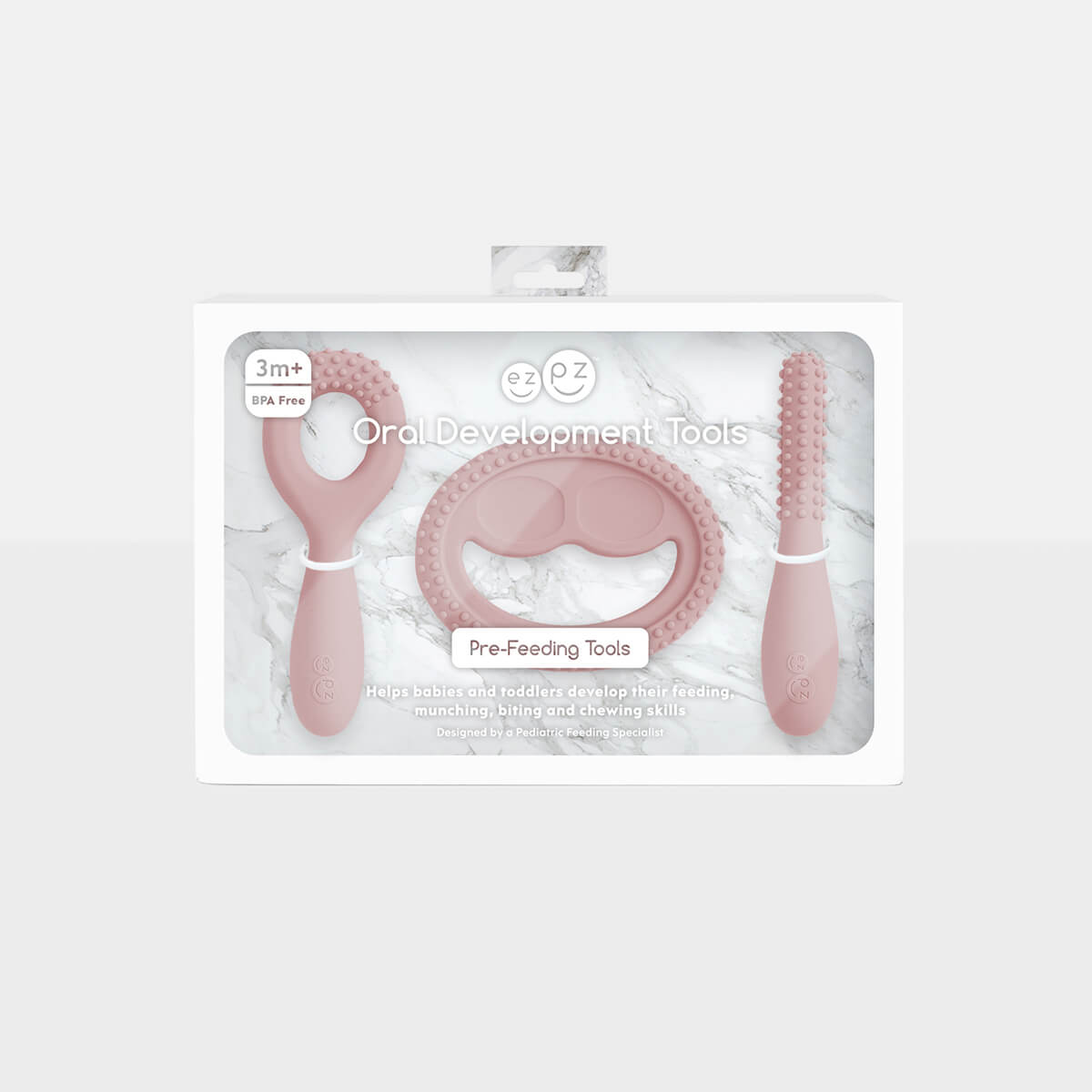 ezpz oral development tools in blush pink / silicone teethers for motor skill development