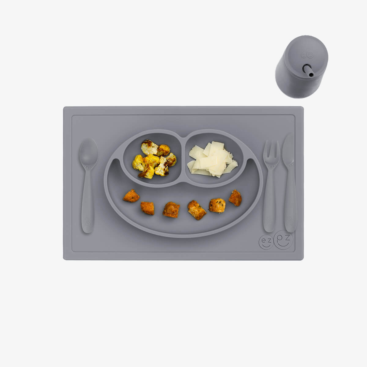 ezpz Happy Feeding Set in Gray / Silicone, Self-Suctioning Plate, Silicone Cup and Straw, Training Utensils for Toddlers