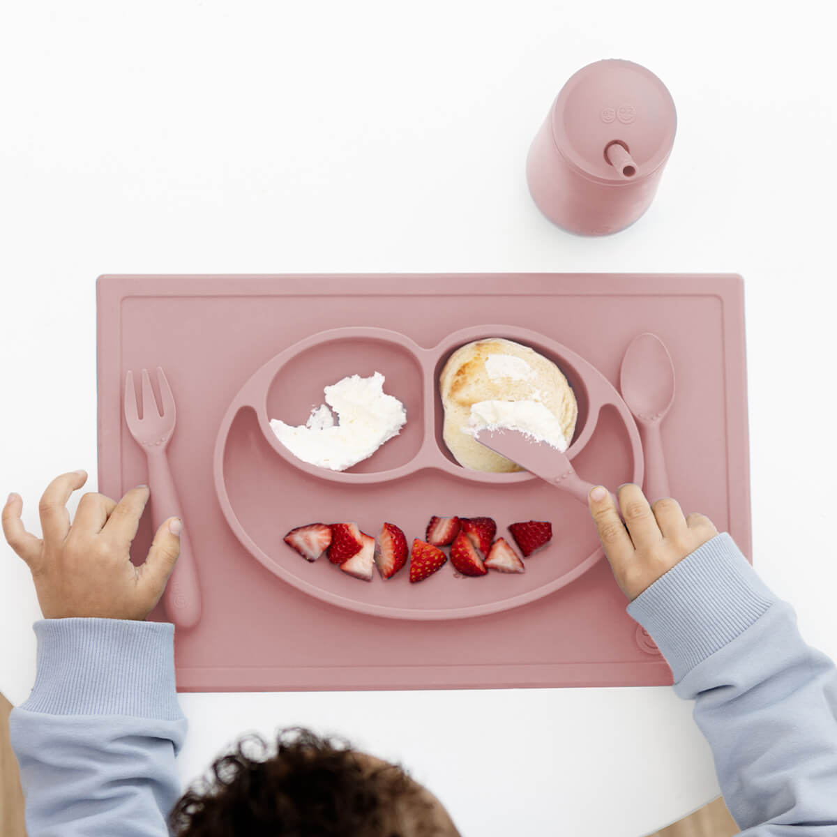 ezpz Happy Feeding Set in Blush / Silicone, Self-Suctioning Plate, Silicone Cup and Straw, Training Utensils for Toddlers
