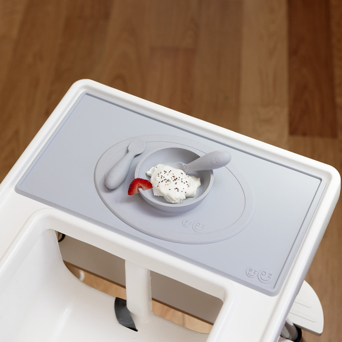 The Tiny Placemat in Pewter is a non-slip, silicone placemat that fits on most highchair trays