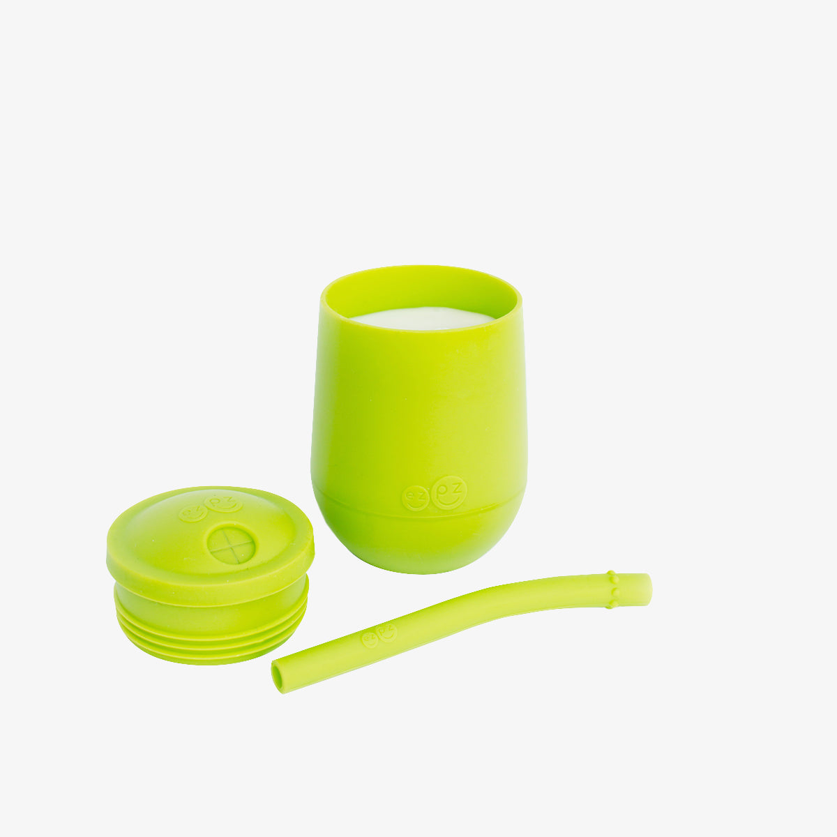 The Mini Cup + Straw in Lime by ezpz / Silicone Drinking Cup and Straw Training System for Toddlers