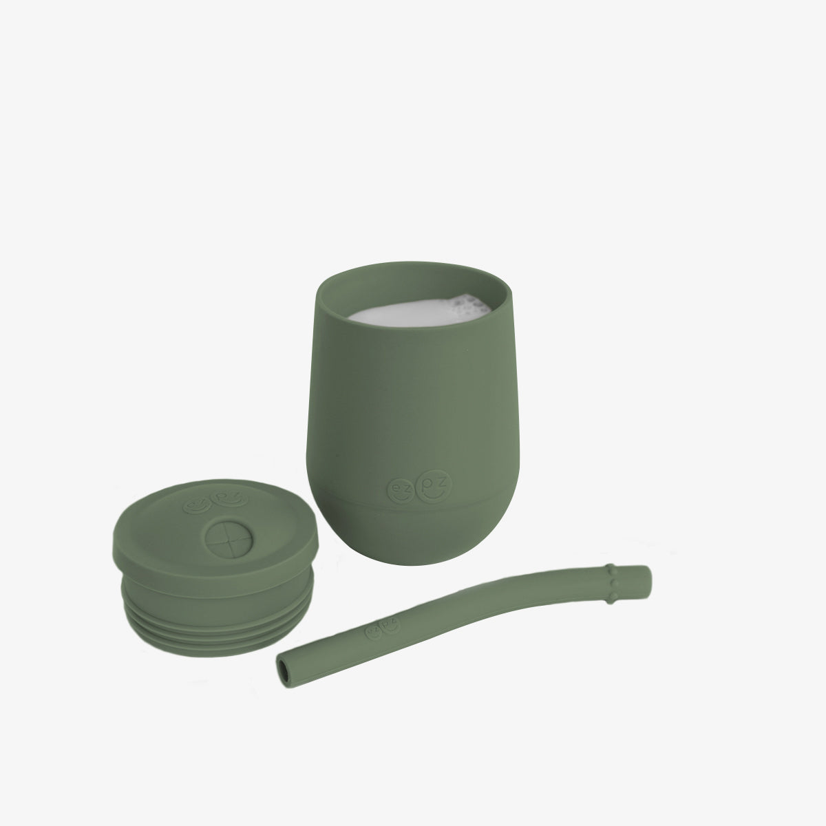 The Mini Cup + Straw in Olive by ezpz / Silicone Drinking Cup and Straw Training System for Toddlers