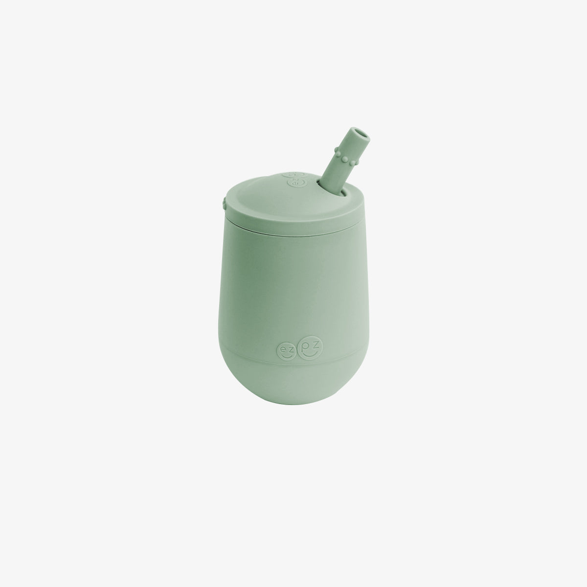 The Mini Cup + Straw in Sage by ezpz / Silicone Drinking Cup and Straw Training System for Toddlers
